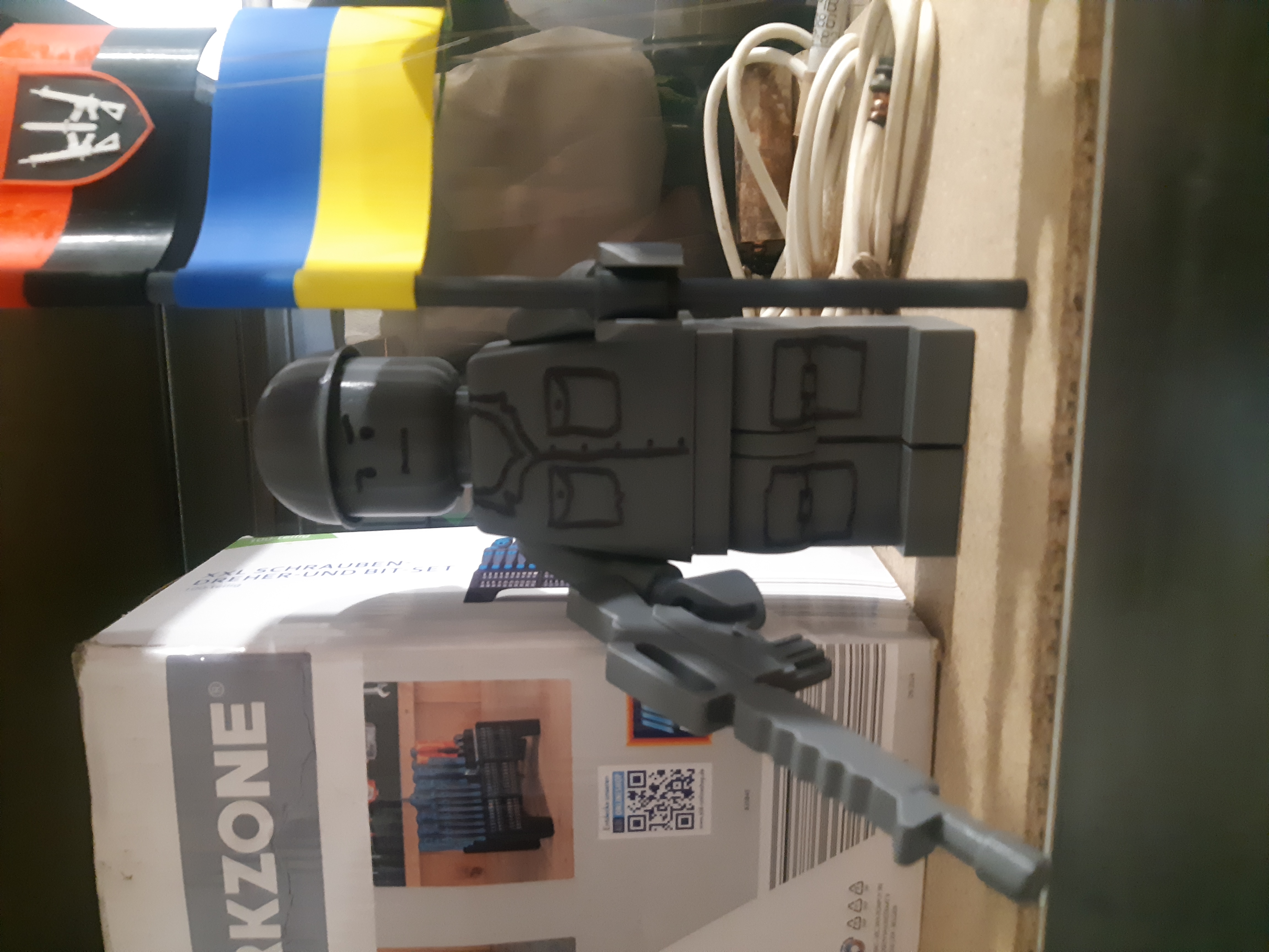 A 3D-printed toy soldier with Ukrainian flags